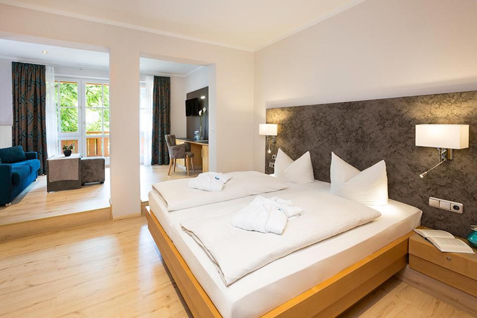 Postel nebo postele na pokoji v ubytování Hotel Wiedemann
