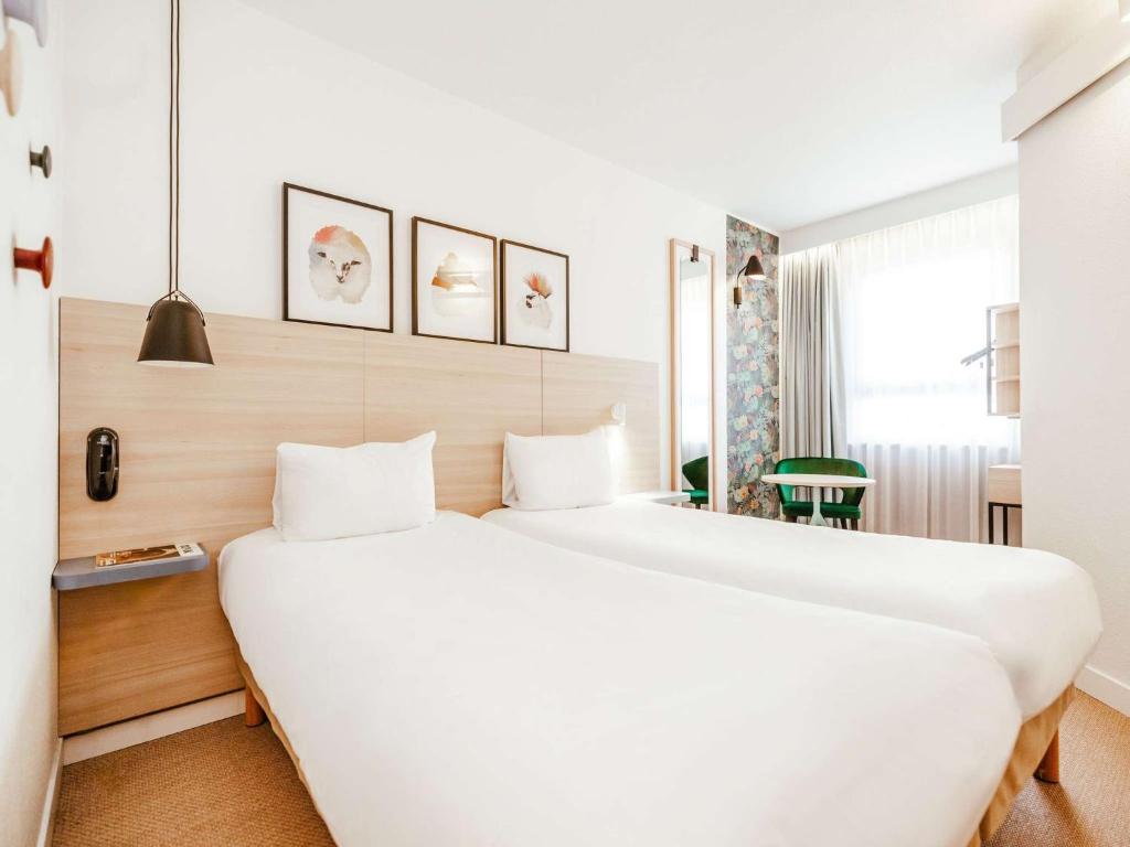 Postel nebo postele na pokoji v ubytování ibis Styles Luxembourg Centre Gare