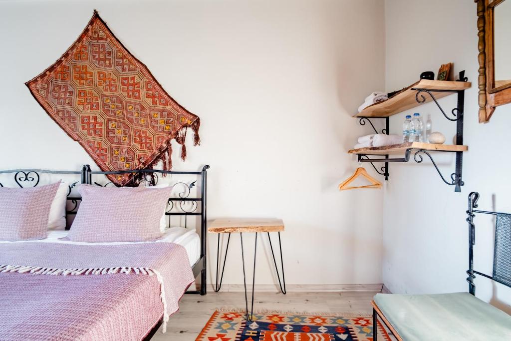 Postel nebo postele na pokoji v ubytování Zen Cappadocia