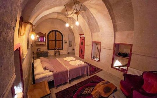 Postel nebo postele na pokoji v ubytování Zen Cappadocia
