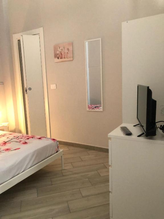 Postel nebo postele na pokoji v ubytování Sicily Sud-Est