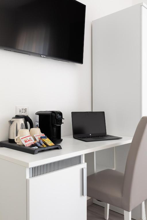 TV a/nebo společenská místnost v ubytování YourHome - Maison degli Aranci