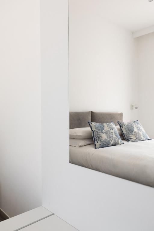 Postel nebo postele na pokoji v ubytování YourHome - Maison degli Aranci