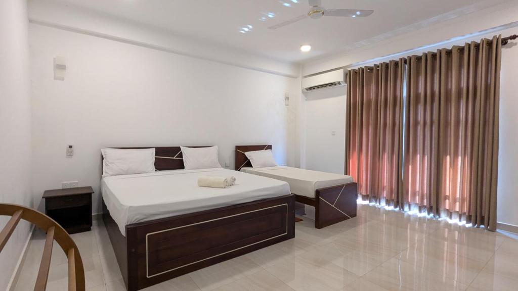 Postel nebo postele na pokoji v ubytování Dutch Villa - Trincomalee