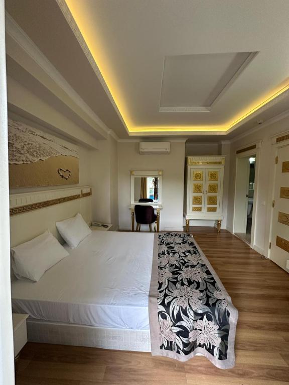 Postel nebo postele na pokoji v ubytování Barby Butik Otel
