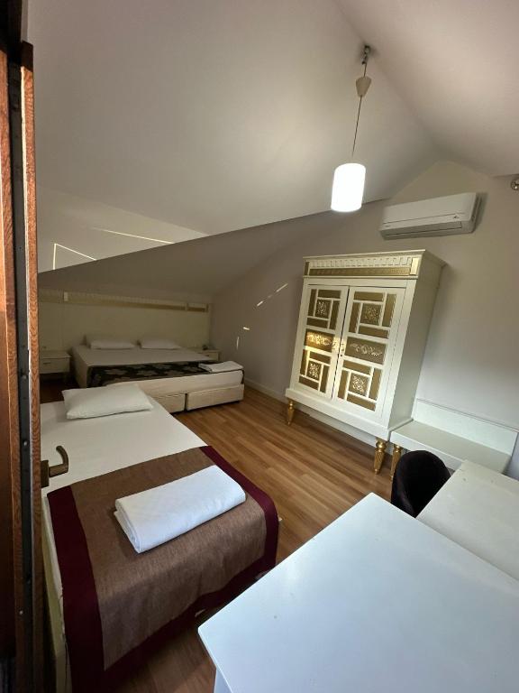 Postel nebo postele na pokoji v ubytování Barby Butik Otel