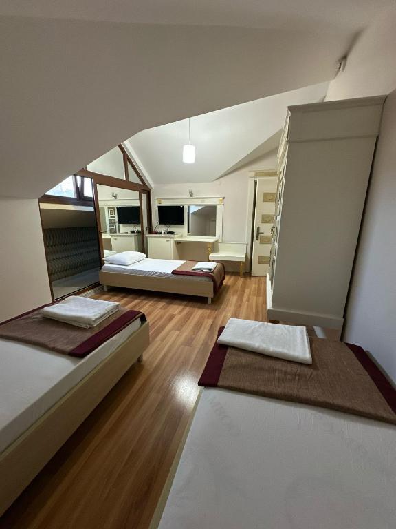 Postel nebo postele na pokoji v ubytování Barby Butik Otel