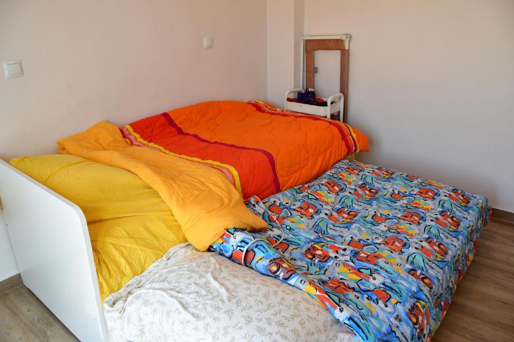Postel nebo postele na pokoji v ubytování Maria's Dreamhouse