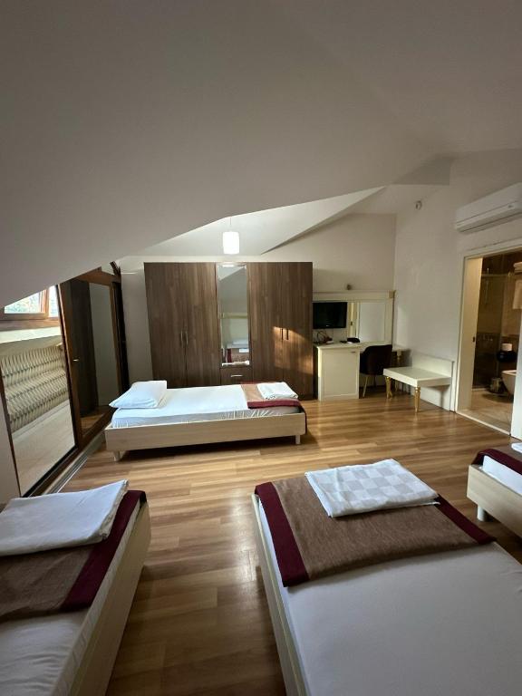 Postel nebo postele na pokoji v ubytování Barby Butik Otel