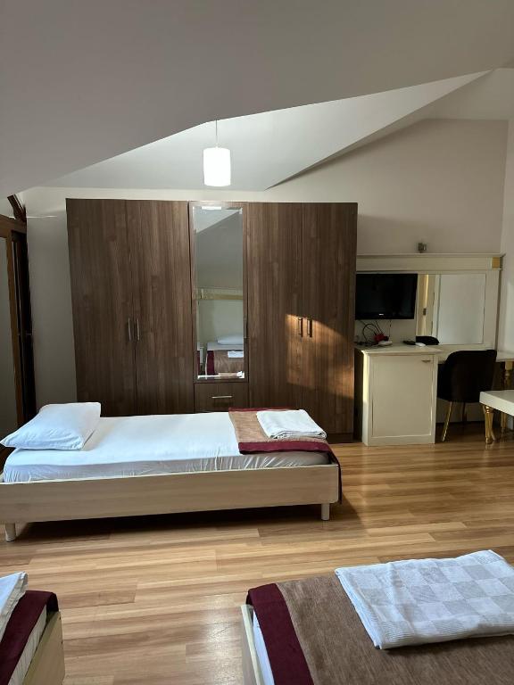 Postel nebo postele na pokoji v ubytování Barby Butik Otel