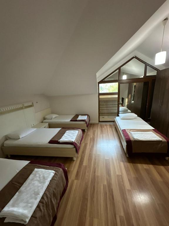 Postel nebo postele na pokoji v ubytování Barby Butik Otel