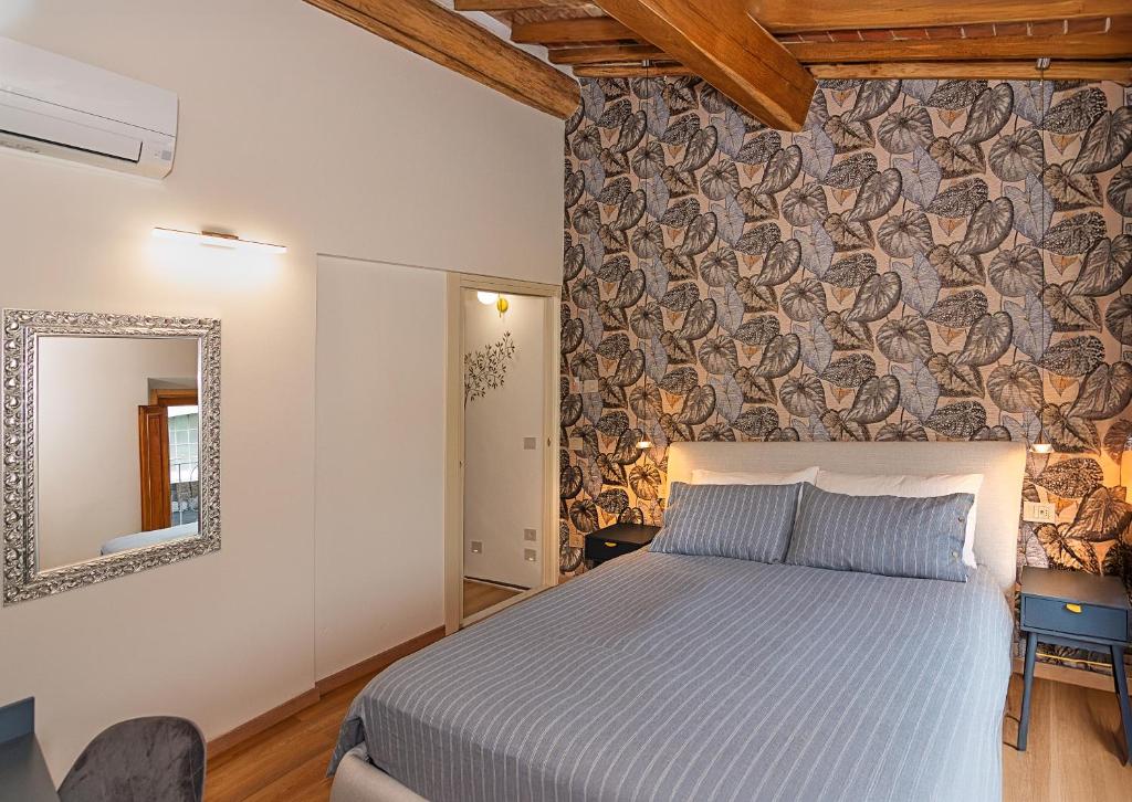 Postel nebo postele na pokoji v ubytování B&B Toringo