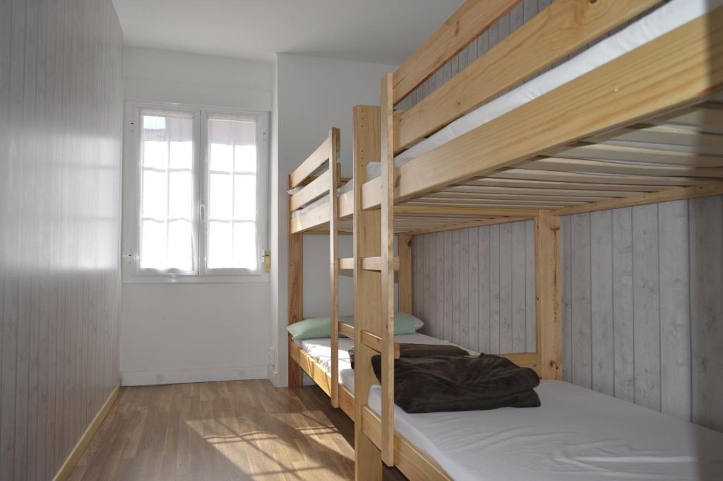 Postel nebo postele na pokoji v ubytování Albergue Gares