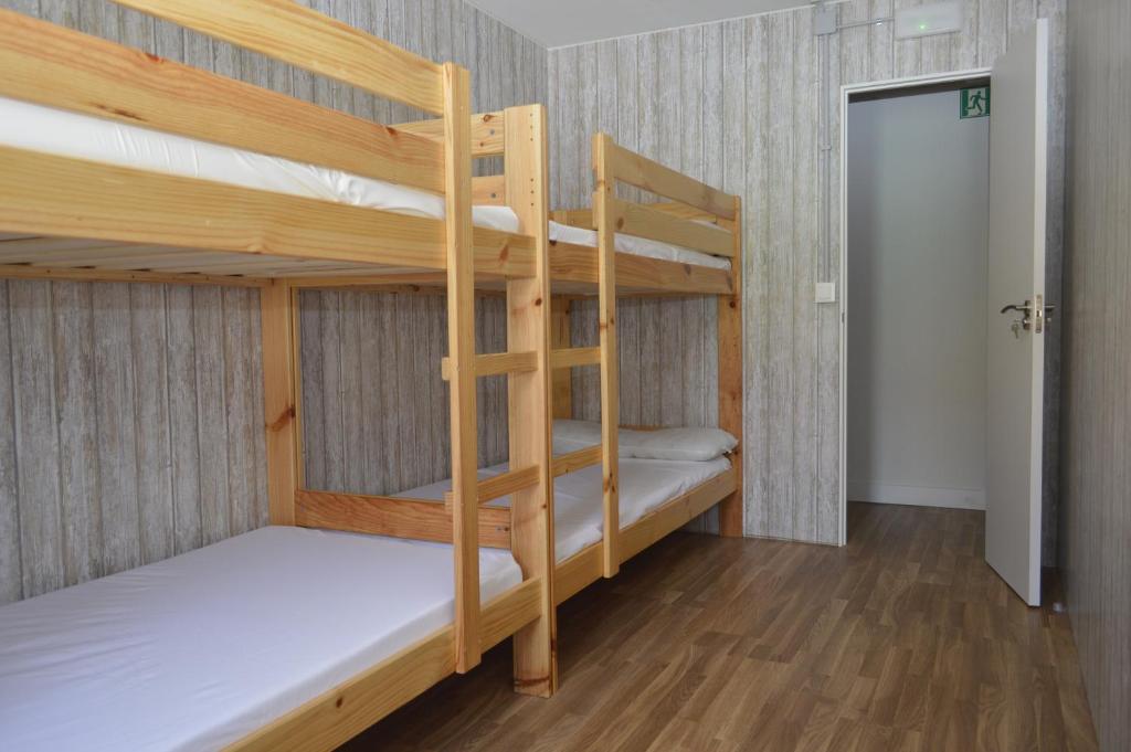 Postel nebo postele na pokoji v ubytování Albergue Gares