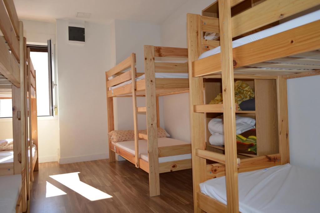 Postel nebo postele na pokoji v ubytování Albergue Gares