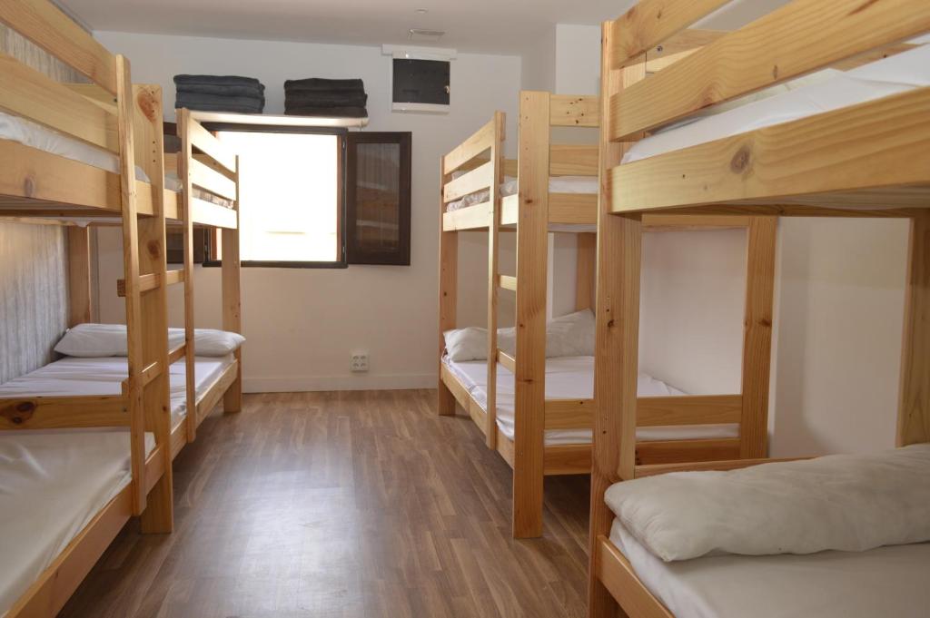 Postel nebo postele na pokoji v ubytování Albergue Gares