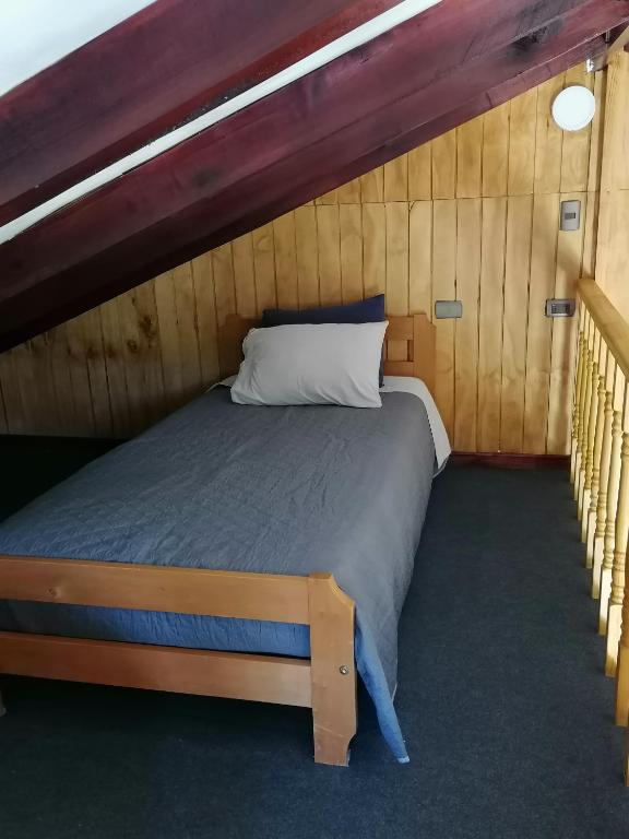 Postel nebo postele na pokoji v ubytování Cabañas CyG - Chaitén