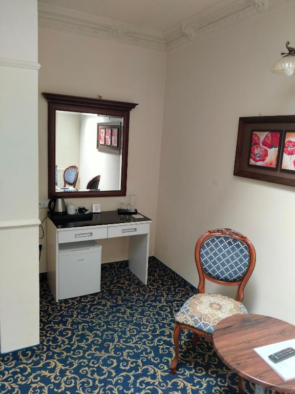 TV a/nebo společenská místnost v ubytování Hotel Venecia Palace