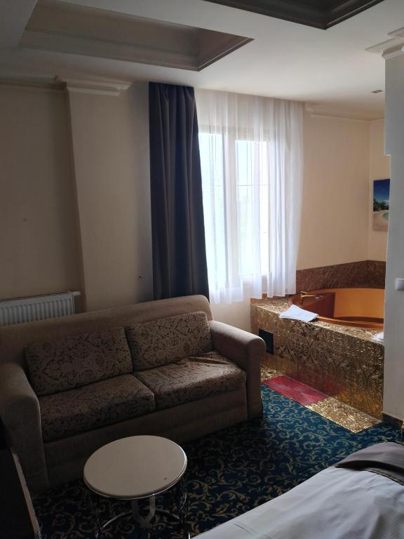 Postel nebo postele na pokoji v ubytování Hotel Venecia Palace