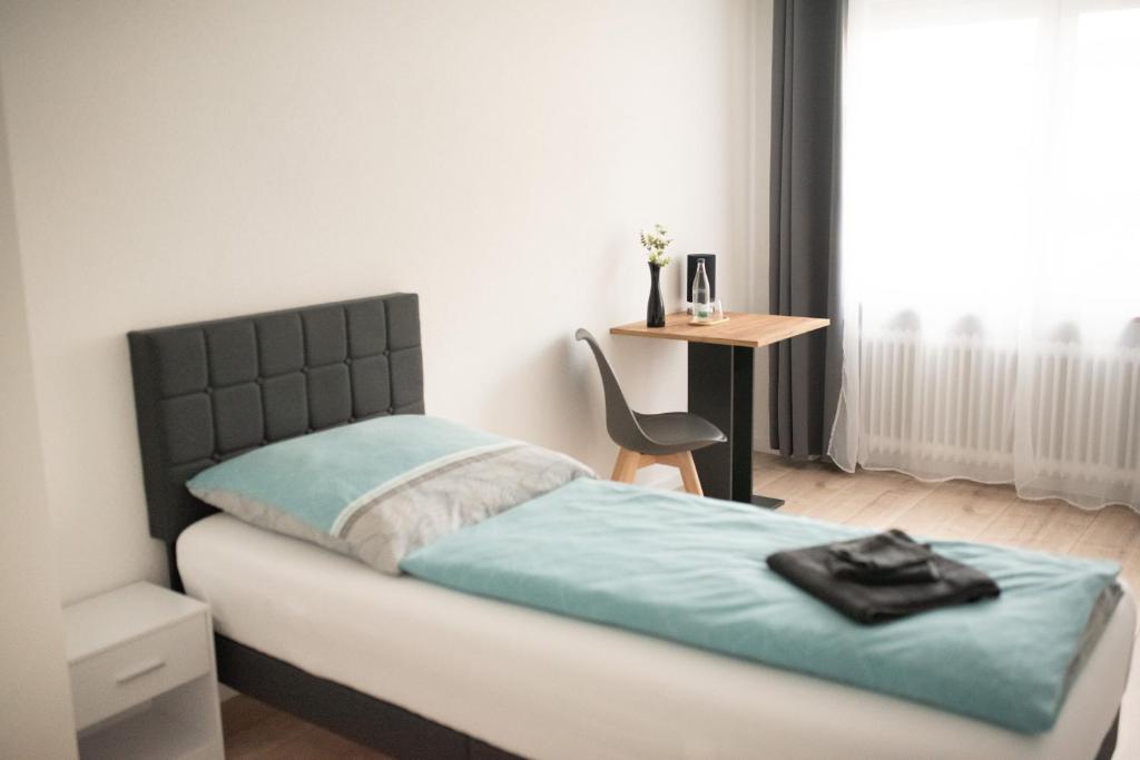 Postel nebo postele na pokoji v ubytování Ferienzimmer Albbruck