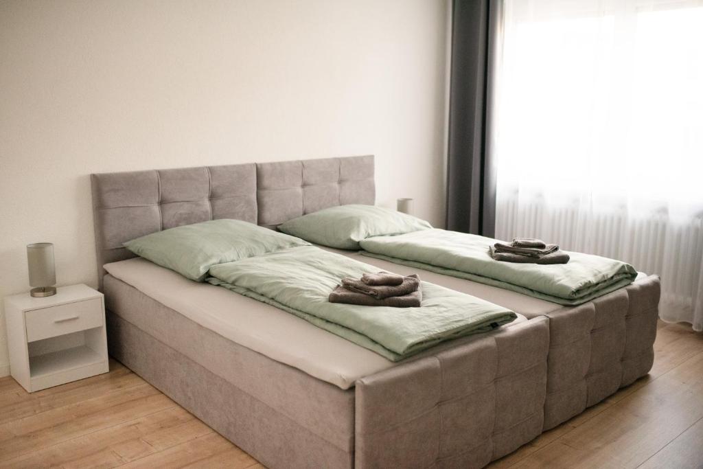 Postel nebo postele na pokoji v ubytování Ferienzimmer Albbruck