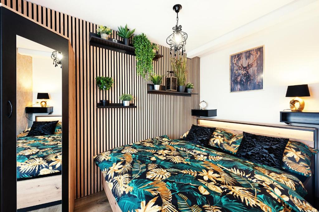 Posteľ alebo postele v izbe v ubytovaní Wellness Apartmány Andrea