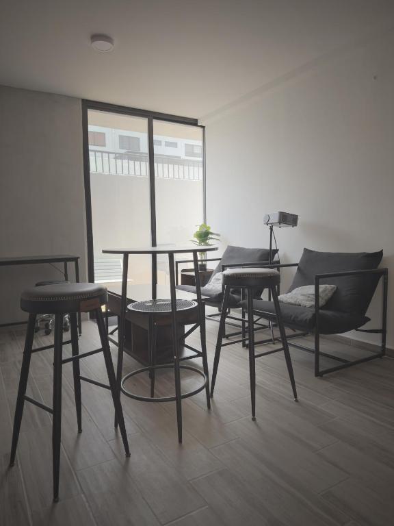 Χώρος καθιστικού στο Departamento con alberca y terraza