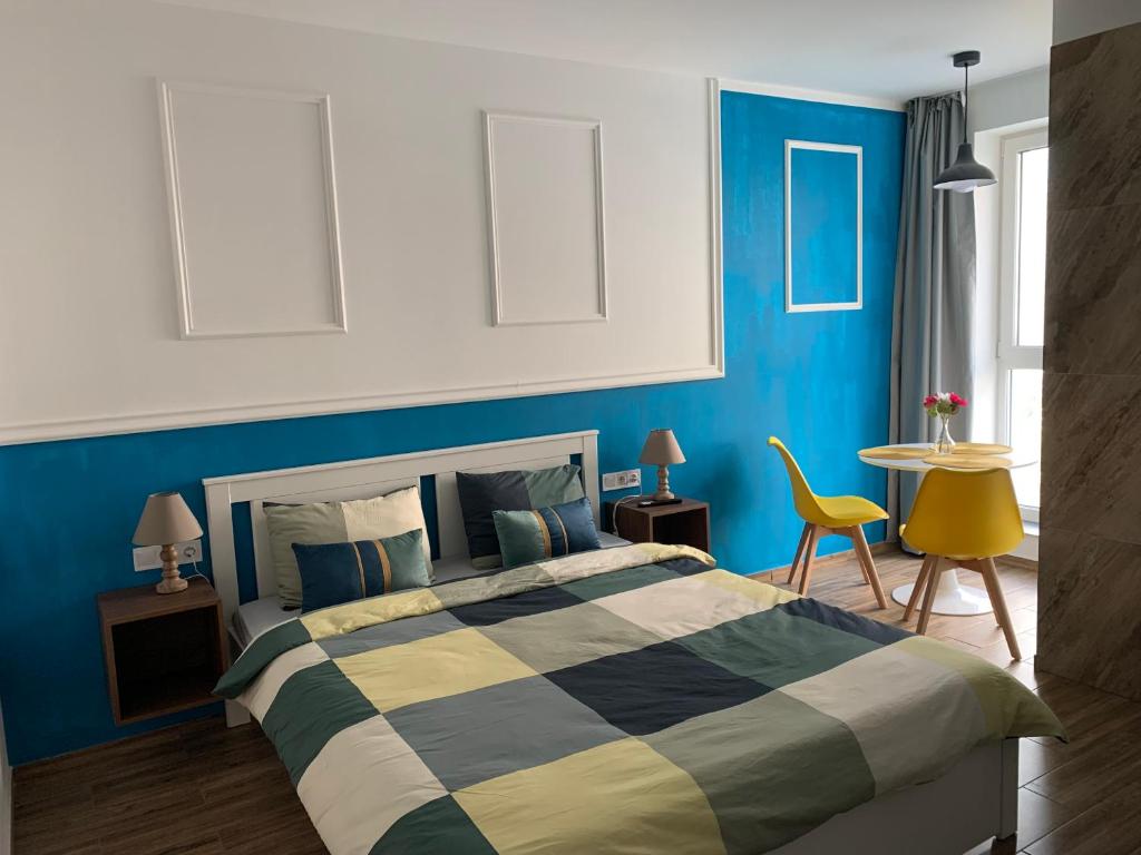 Ένα ή περισσότερα κρεβάτια σε δωμάτιο στο DBO Shopping City Apartments