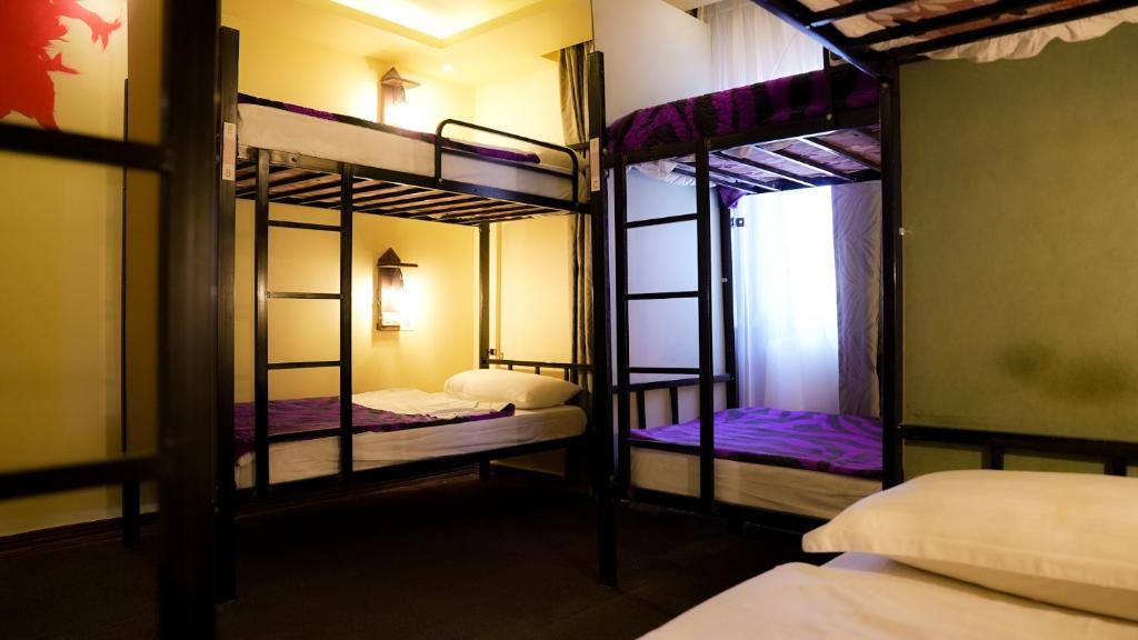 Postel nebo postele na pokoji v ubytování Rafiki Hostel