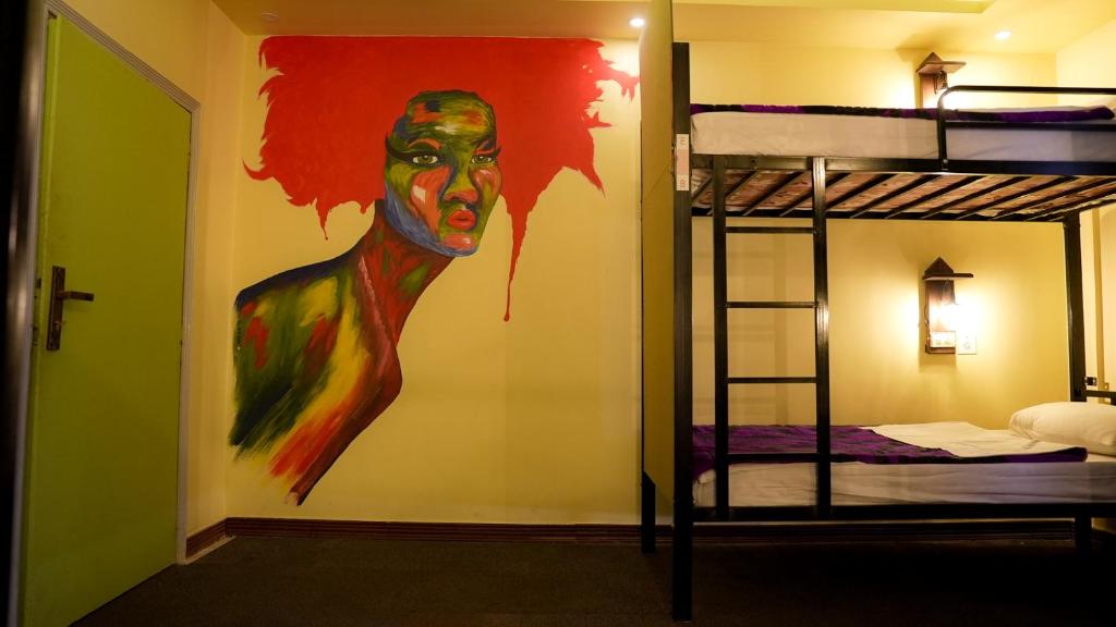 Postel nebo postele na pokoji v ubytování Rafiki Hostel