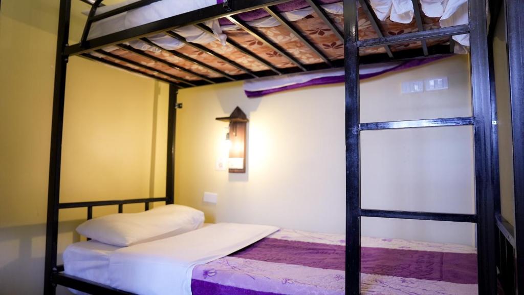 Postel nebo postele na pokoji v ubytování Rafiki Hostel