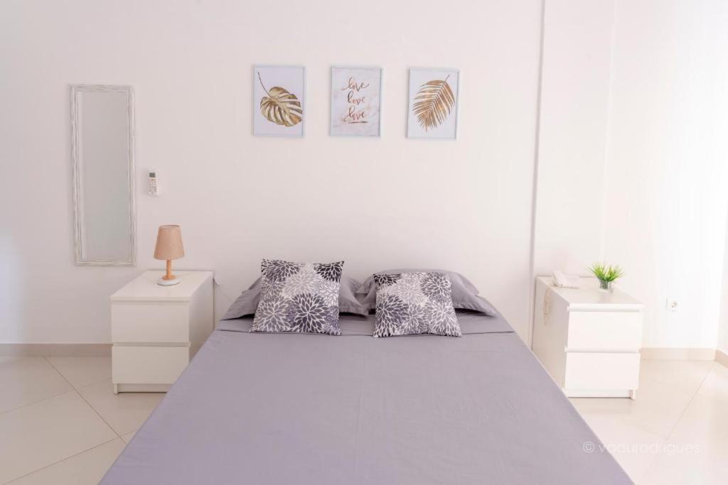 Postel nebo postele na pokoji v ubytování Urban Praia Maria - ApartHotel