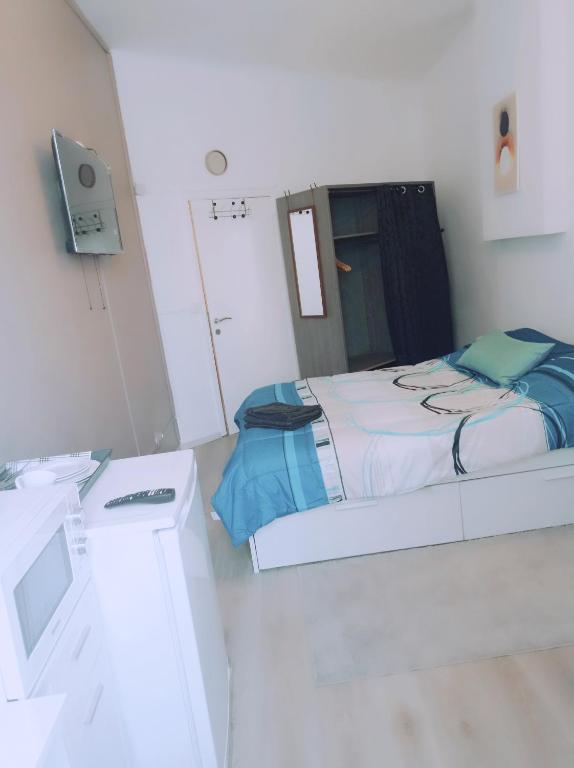 Postel nebo postele na pokoji v ubytování Chez Opportune