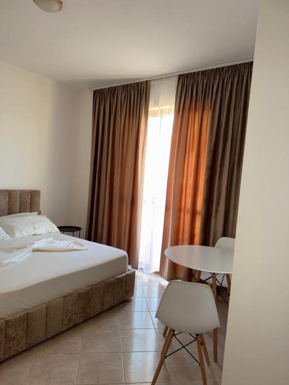 Postel nebo postele na pokoji v ubytování Hotel Ermi