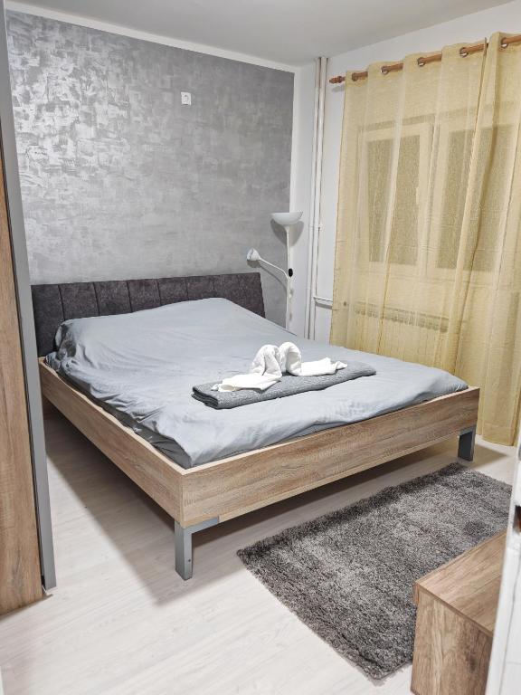 Postel nebo postele na pokoji v ubytování Stan na dan Smederevska palanka