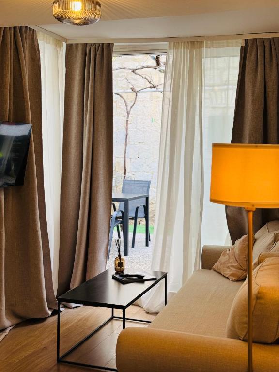 Televízia a/alebo spoločenská miestnosť v ubytovaní Apartment Stari Dvor