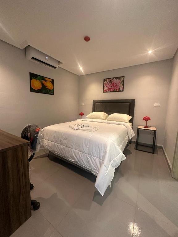 Postel nebo postele na pokoji v ubytování Hotel margarita s