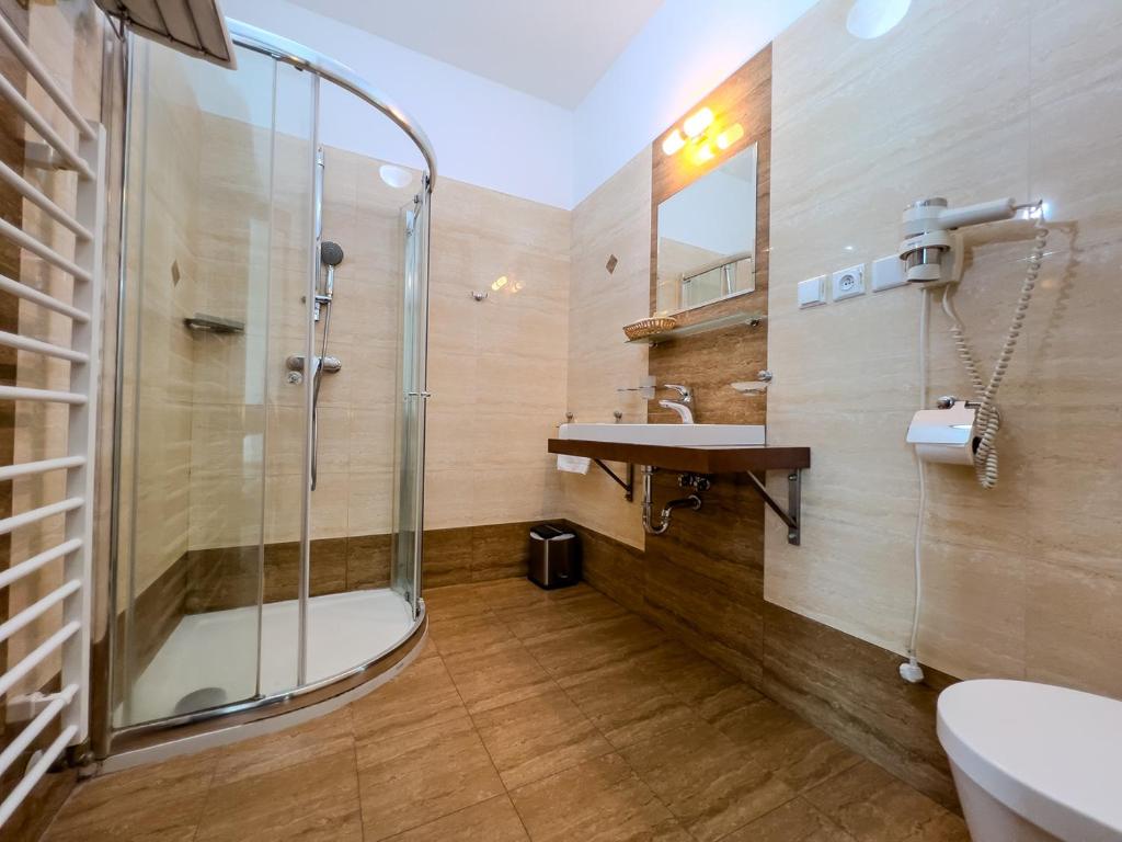 Koupelna v ubytování Hotel Arman