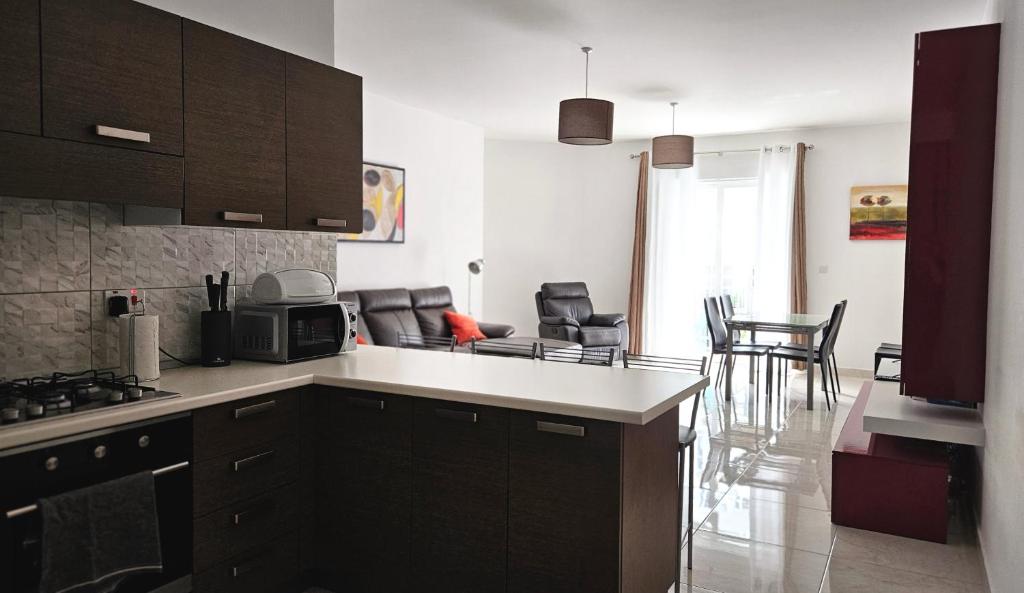 Kuchyň nebo kuchyňský kout v ubytování Calypso Apartment