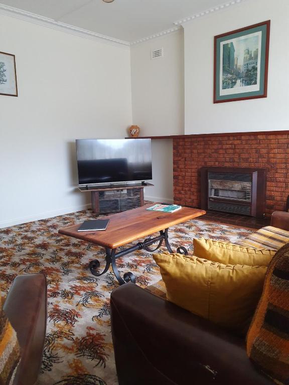 TV a/nebo společenská místnost v ubytování Break-A-Way Accommodation