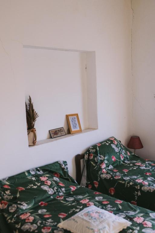 Postel nebo postele na pokoji v ubytování Casa Tota