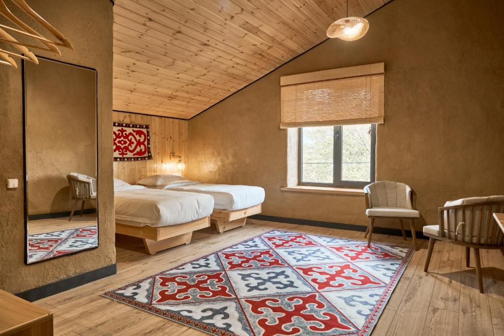 Postel nebo postele na pokoji v ubytování Pristine Hotel