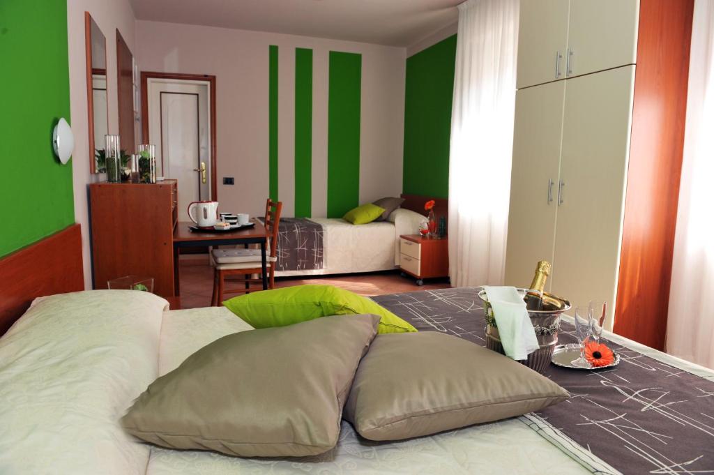 Postel nebo postele na pokoji v ubytování Hotel Bellavista Meublè