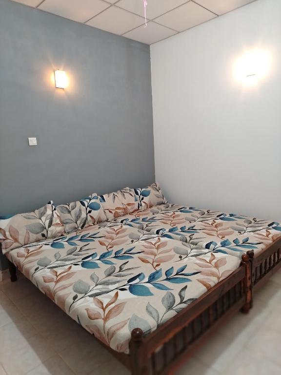 Postel nebo postele na pokoji v ubytování Corner Cottage - Anuradhapura