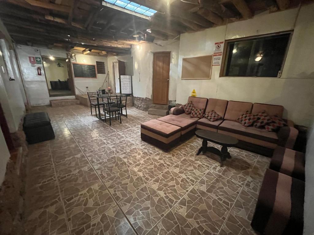 Posezení v ubytování Intihuatana Hostel
