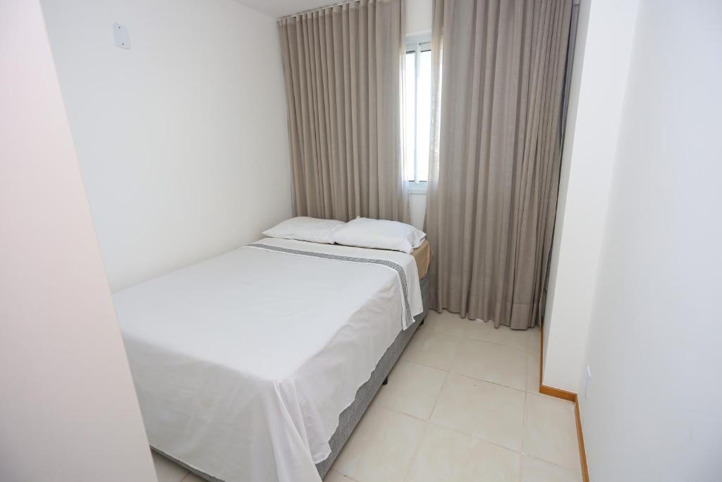 A bed or beds in a room at Cobertura Sublime Max