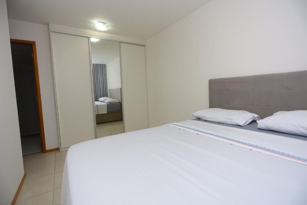 A bed or beds in a room at Cobertura Sublime Max