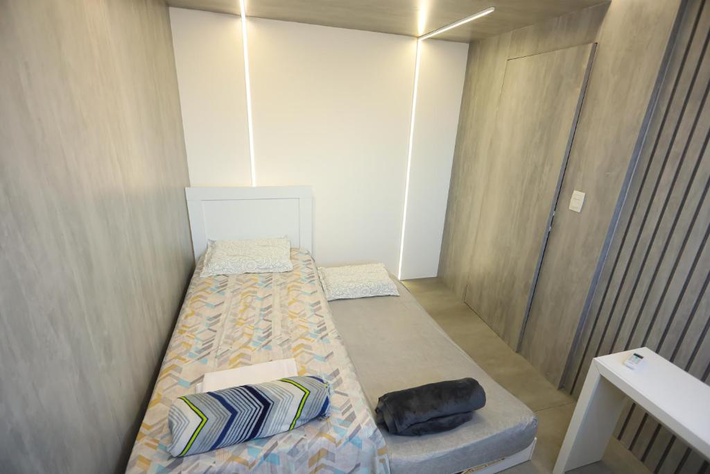 A bed or beds in a room at Cobertura Sublime Max