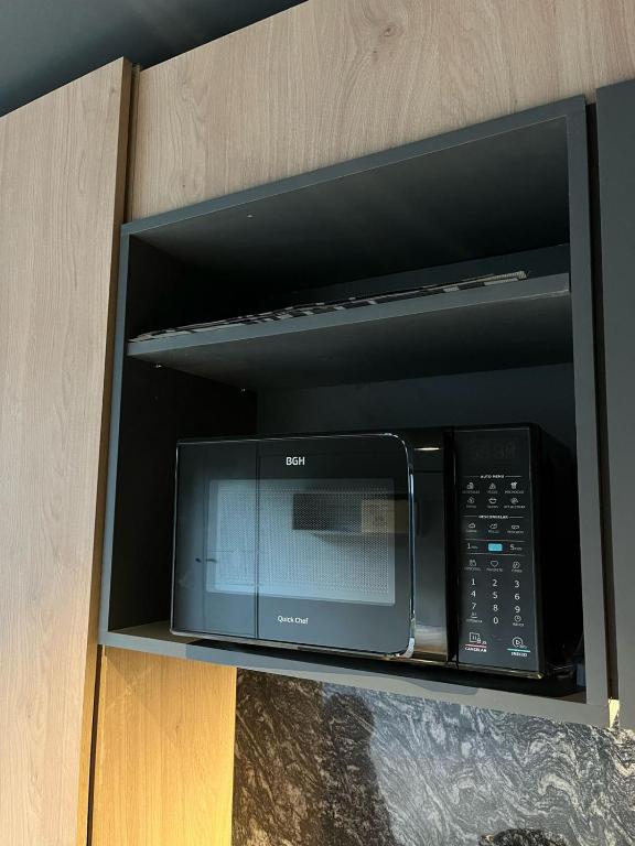Kuchyň nebo kuchyňský kout v ubytování Edificio Pantera - monoambiente de diseño