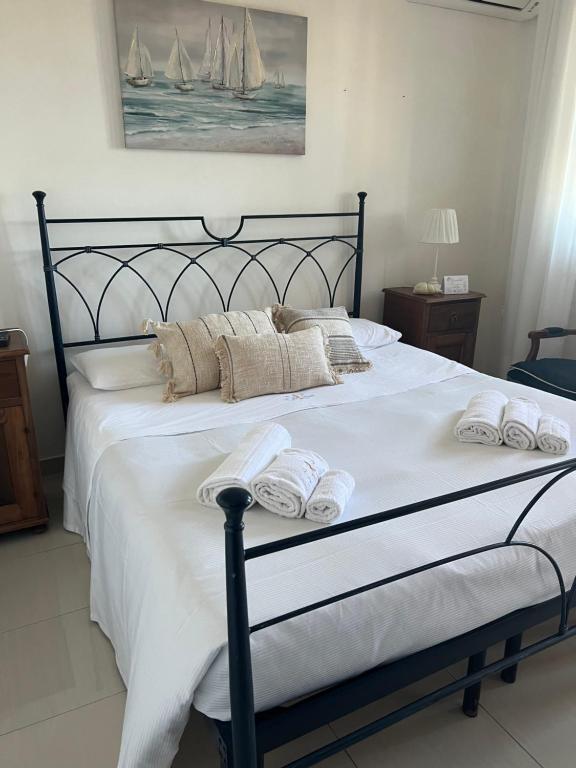Postel nebo postele na pokoji v ubytování B&B Villa Striari